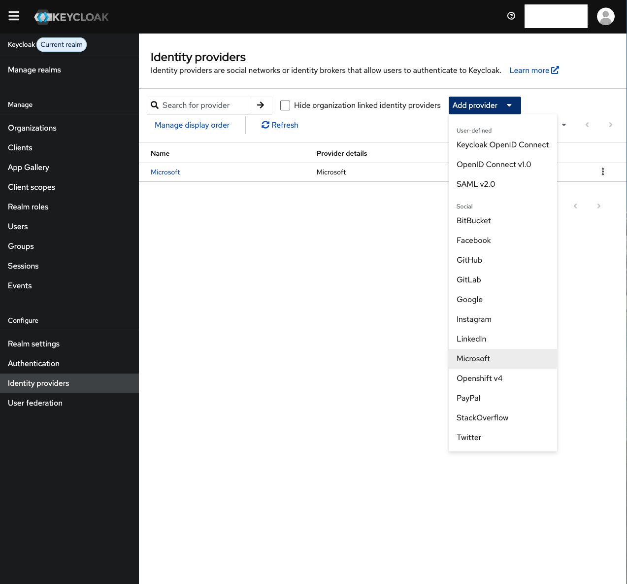 Keycloak admin console showing the OpenID Connect v1.0 provider form configured for a tenant-specific Microsoft Entra ID setup