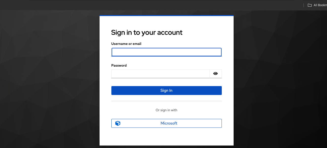 Keycloak login page showing a Sign in with Microsoft button below the standard login form