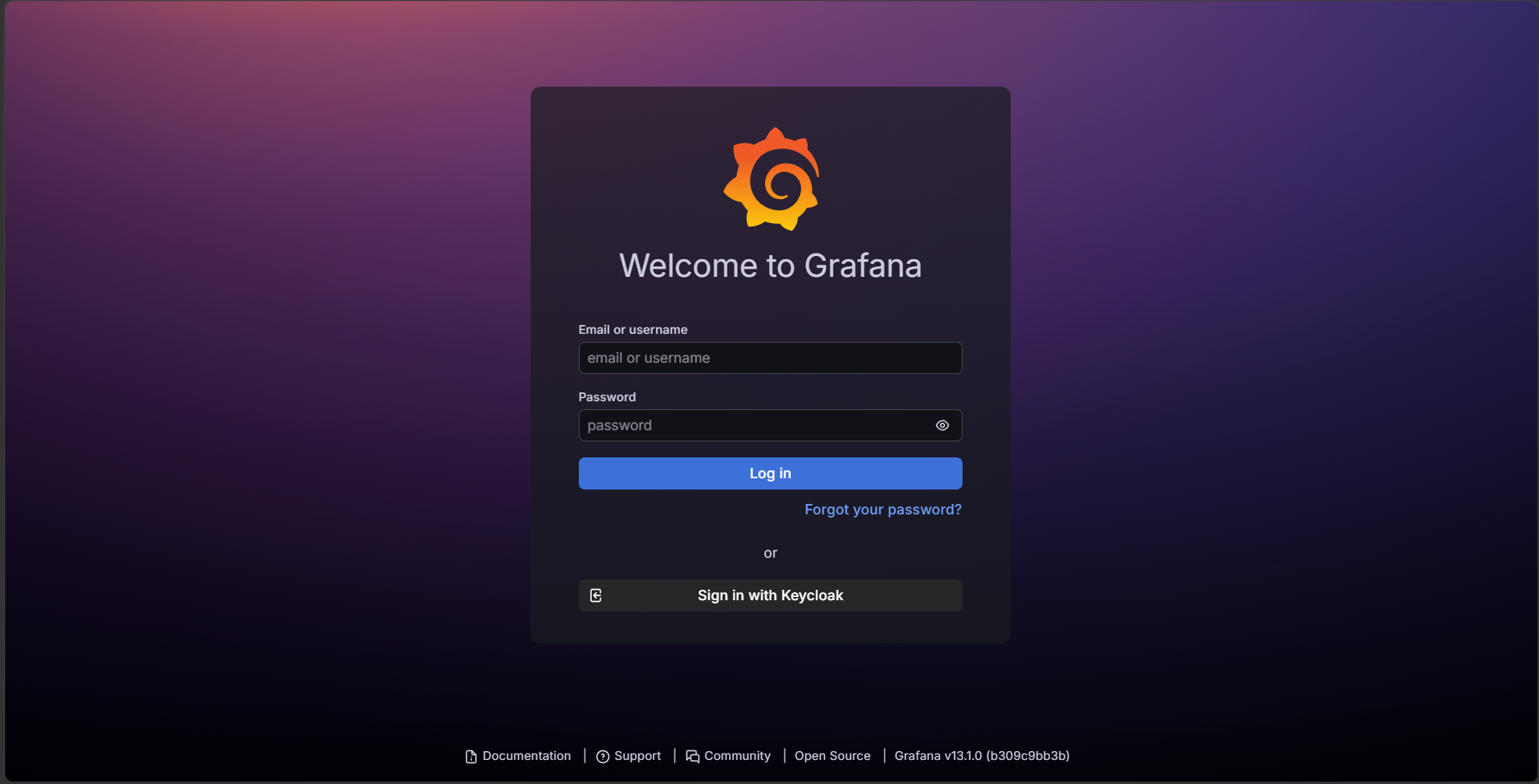 Grafana login page showing username and password fields with a Sign in with Keycloak button below them